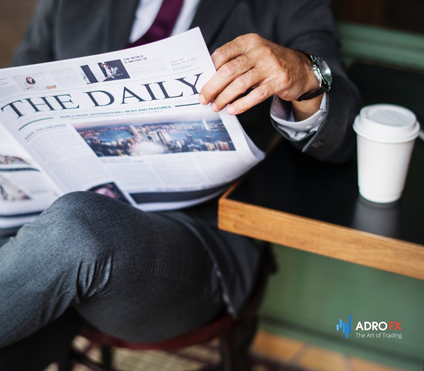 man-with-a-news-paper-in-his-hand